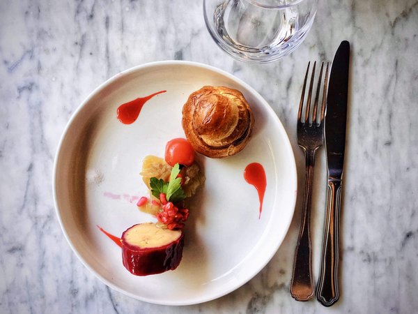 Qual è il modo migliore per cucinare un polpo tenero con patate e paprika affumicata?